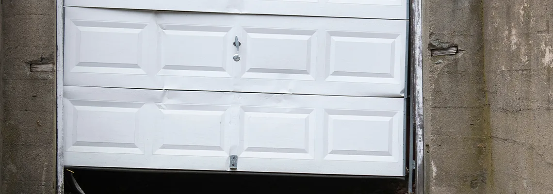 Garage Door Got Hit By A Car Dent Removal in Milton, ON