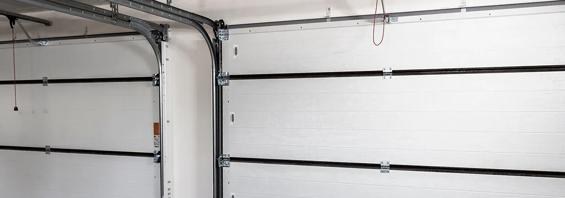 Fix Folding Garage Door Jerking in Milton, Ontario